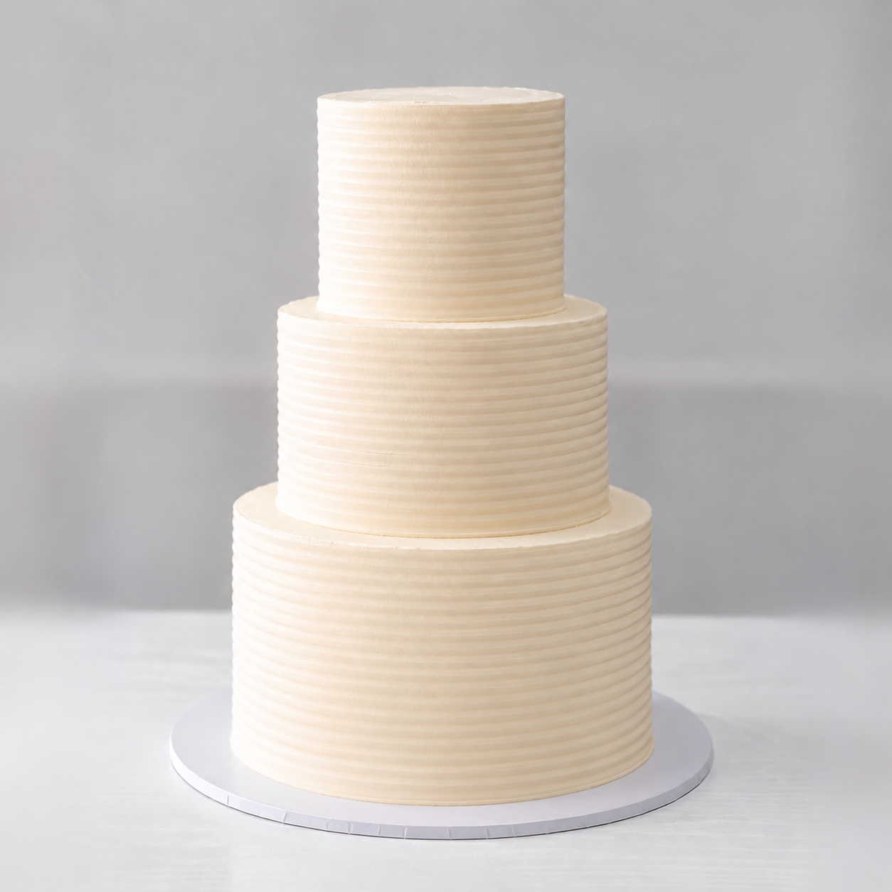 Owner cake reference showing regular combed buttercream ridges