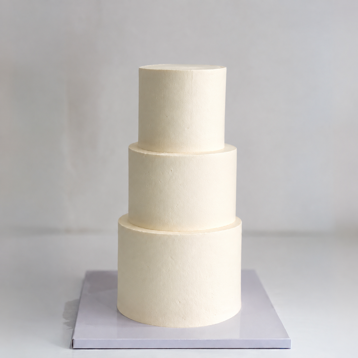 Owner cake reference showing smooth buttercream coverage
