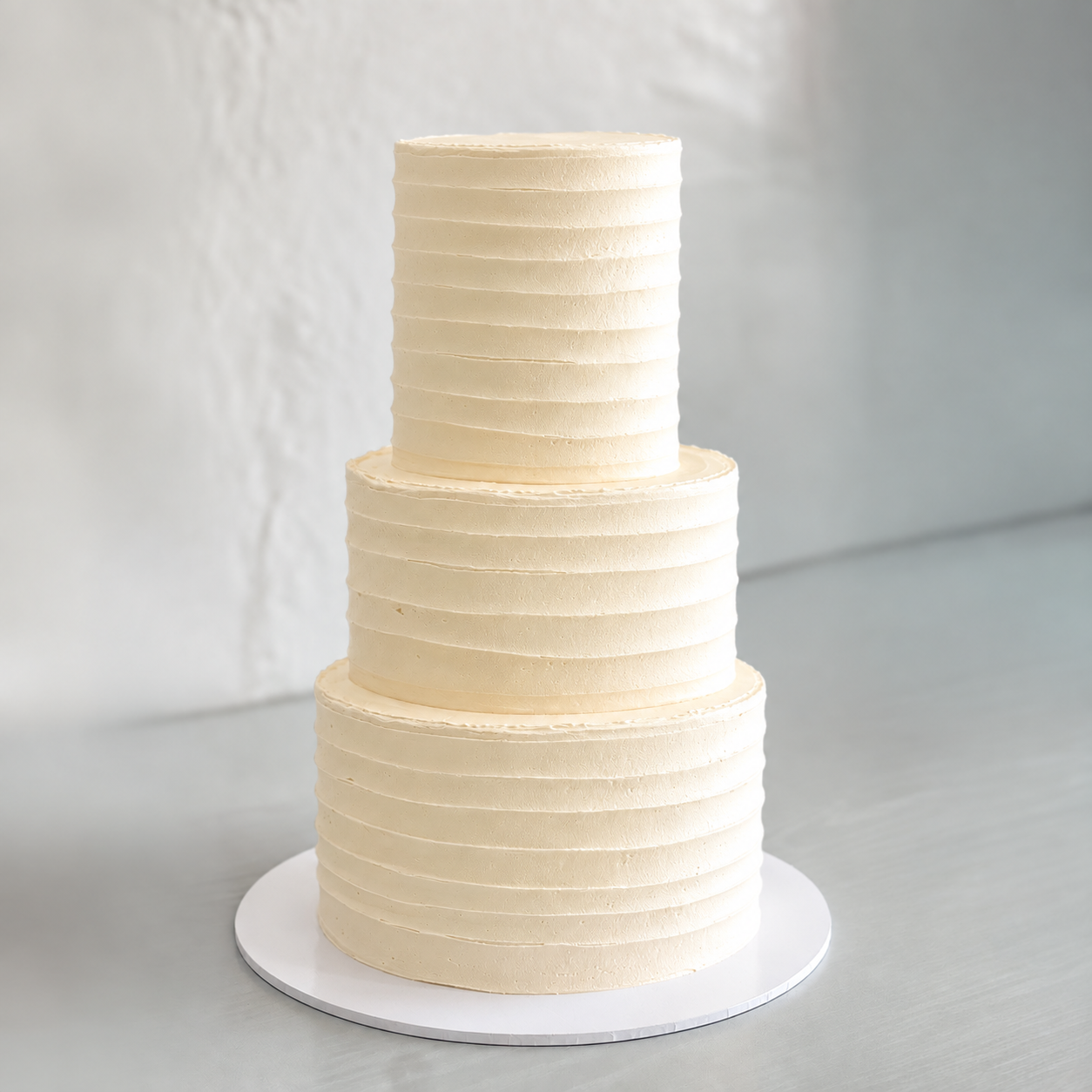 Owner cake reference showing textured buttercream